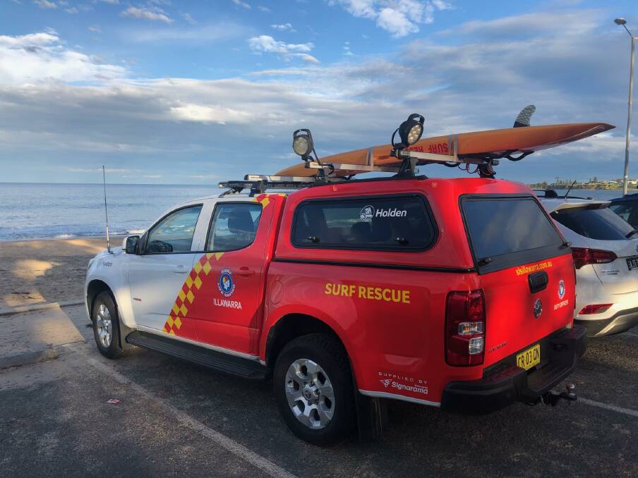 The Surf Life Saving Illawarra duty officer at Thirroul beach following reports a boat is on fire offshore. Picture: Anthony Turner