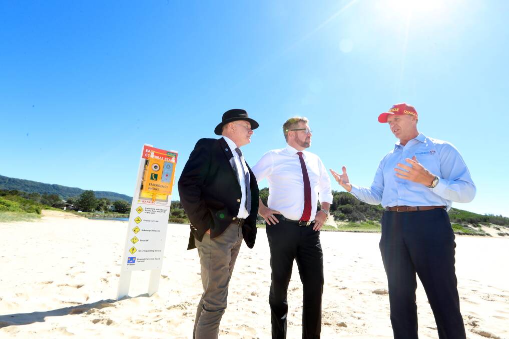 Wollongong lord mayor Gordon Bradbery (left), Emergency Services Minister Troy Grant and SLSNSW chief executive Steven Pearce.