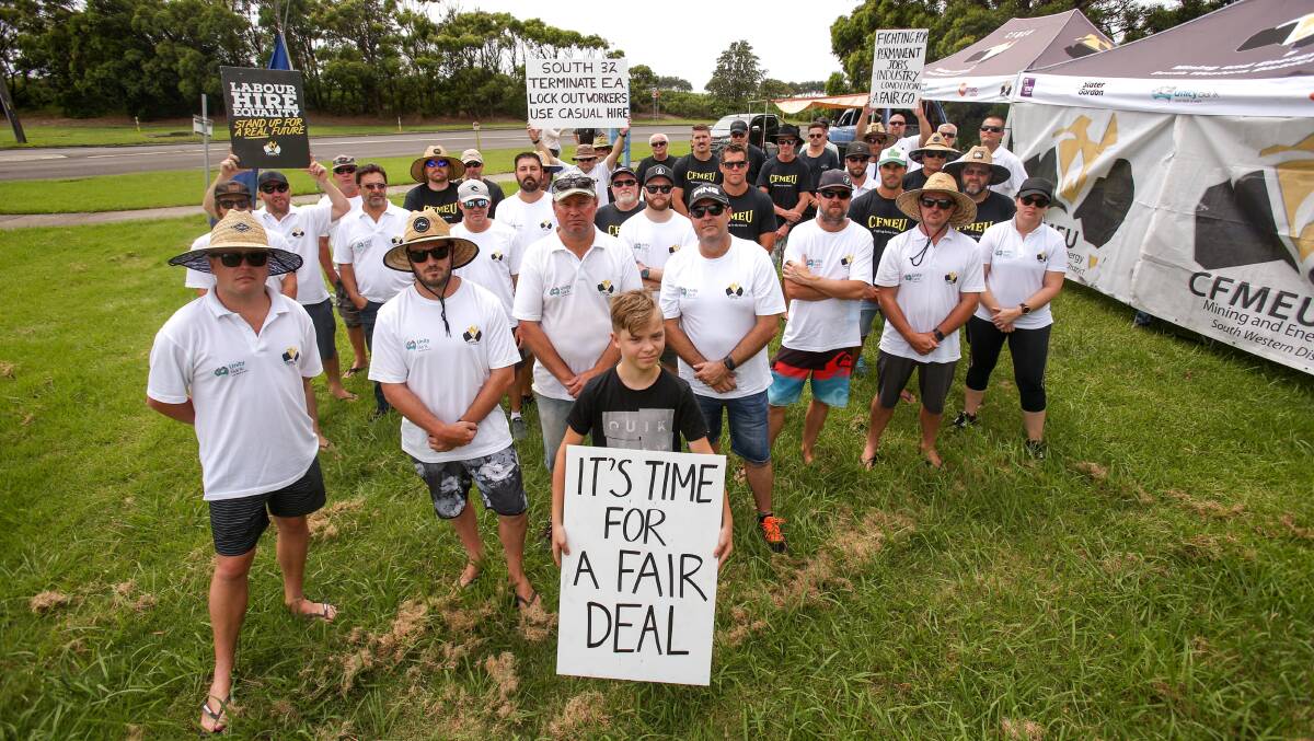 Workers picket outside Port Kembla Coal Terminal after being locked out last month. The company has imposed another six-day lockout. Picture: Adam McLean