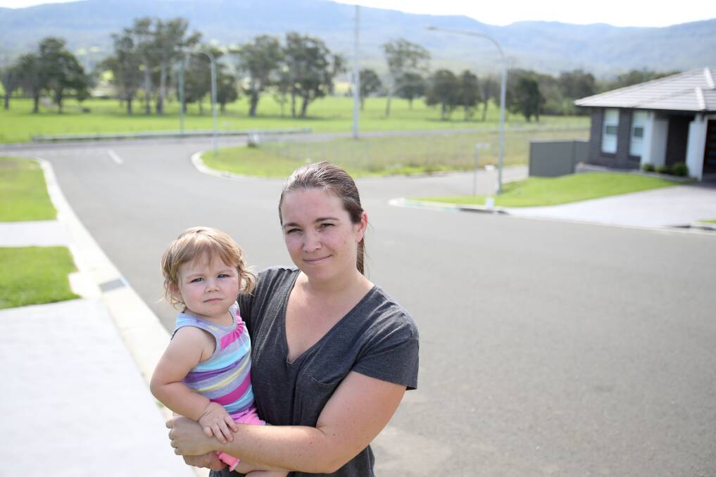 Sarah Lau - with 15-month-old daughter, Zali - opposes the potential prison. Picture: Adam McLean