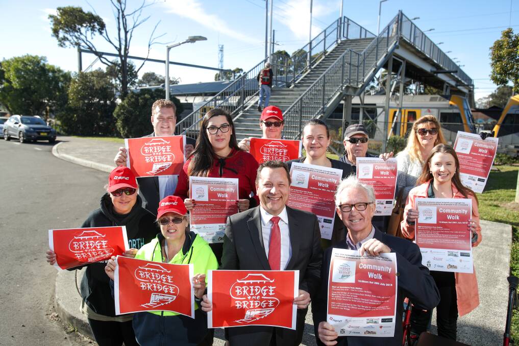 Wollongong MP Paul Scully joins members of the Unanderra Access Group and the Flagstaff Group at Unanderra station on Friday for the launch of the upcoming 'Bridge the Bridge' awareness walk. Picture: Adam McLean