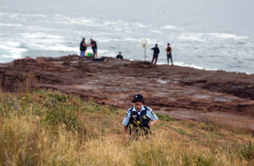 WARNING: The scene at Honeycomb Rocks, below Hill 60 at Port Kembla, on Friday. Police have warned fishers to "never turn your back to the ocean". Pictures: Robert Peet