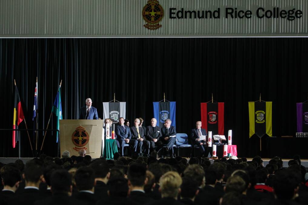 Parliamentary secretary for education Gareth Ward uses an Edmund Rice College assembly on Wednesday to announce government funding of $1.2 million for arts and hospitality facilities. Picture: Adam McLean