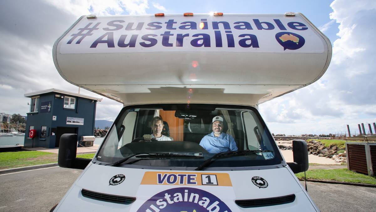 Sustainable Australia president William Bourke with Wollongong candidate Andrew Anthony in 'Winnie' the Winnebago. Winnie is where Mr Bourke eats, sleeps, and sh...owers leading up to the election. Picture: Adam McLean