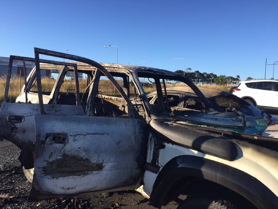 The burnt-out Toyota Land Cruiser and Ford Focus. The two cars were destroyed by fire at Shellharbour on Tuesday night and police say the fires are being treated as suspicious. 