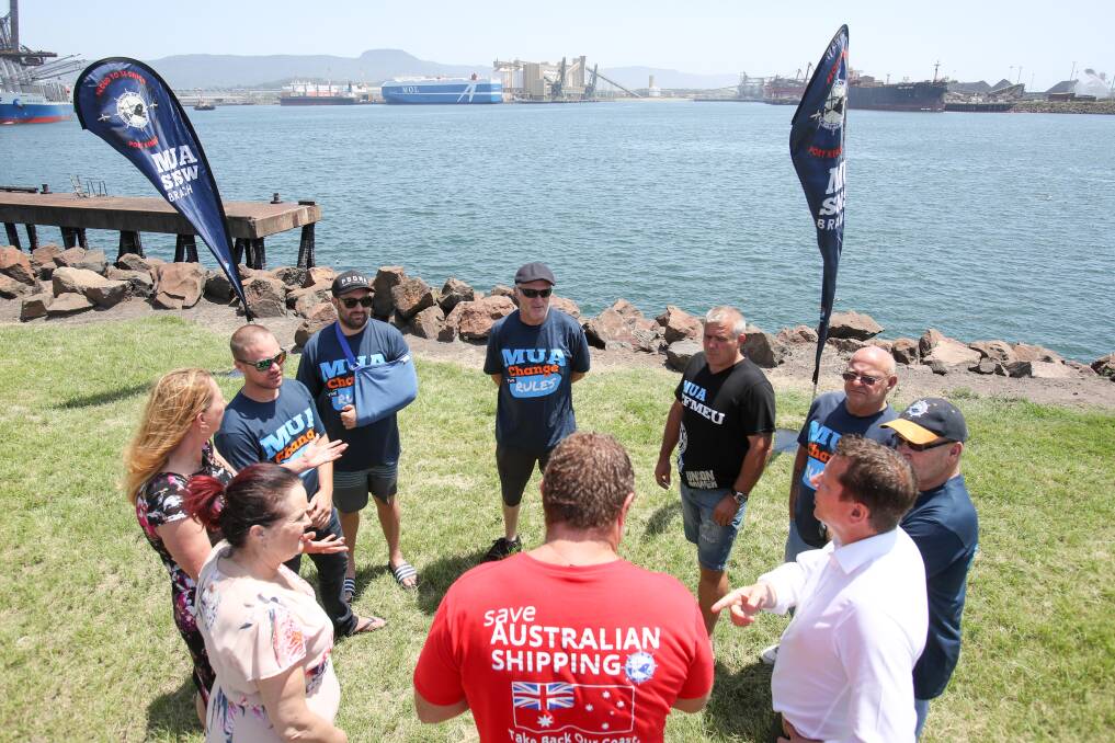 Will Zisis (with arm in sling) and fellow seafarers, from the last Australian vessels operated by BHP and BlueScope, chat with state and federal Illawarra Labor MPs at Port Kembla on Friday. Picture: Adam McLean