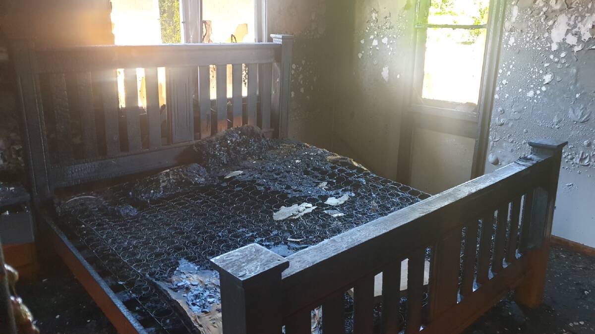 A bedroom was destroyed after a fire erupted inside a Bulli home just after midday on Wednesday. Picture by Bulli FRNSW
