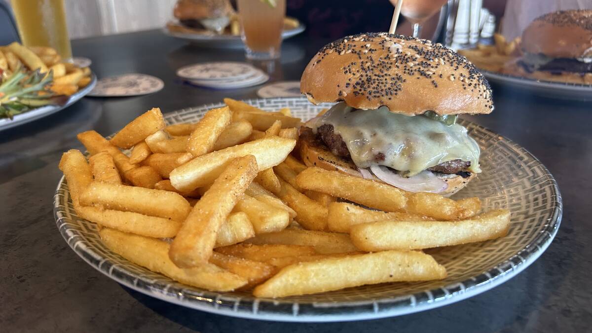 The Royal Cheese burger served up at the Waterfront Tavern in Shell Cove Marina. Picture by Nadine Morton