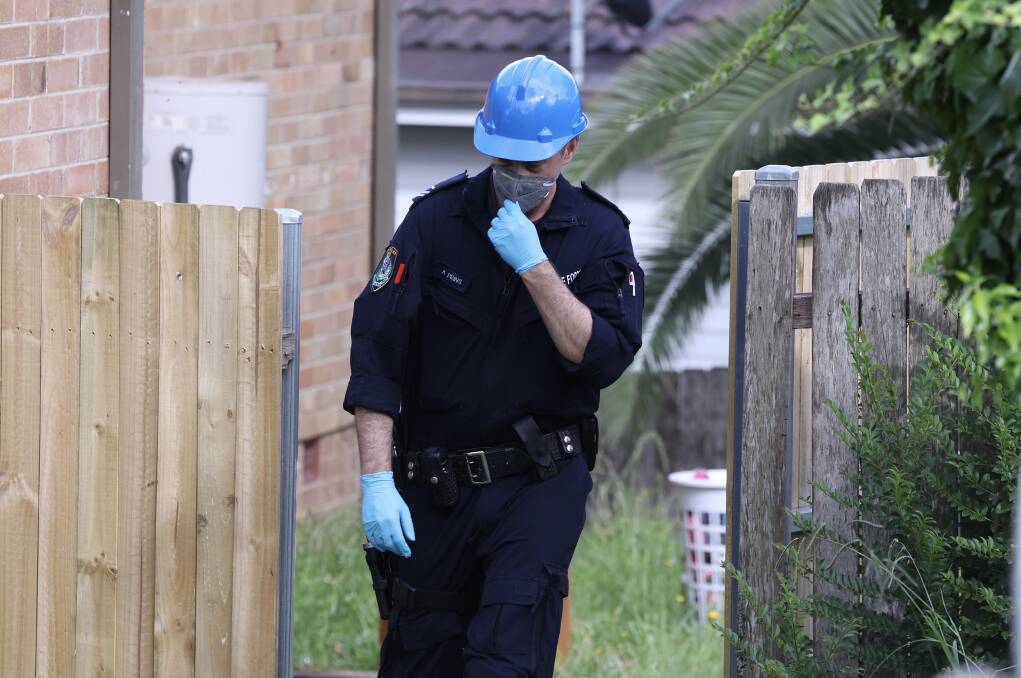 NSW Police investigators at the scene of a suspicious house fire on Kelly Street, Berkeley on January 5, 2024. Pictures by Adam McLean