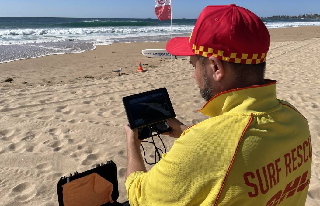 Surf lifesaver Robert Gorkin was operating a drone in the search for a missing swimmer off Fairy Meadow on Tuesday, October 31. Picture by Nadine Morton