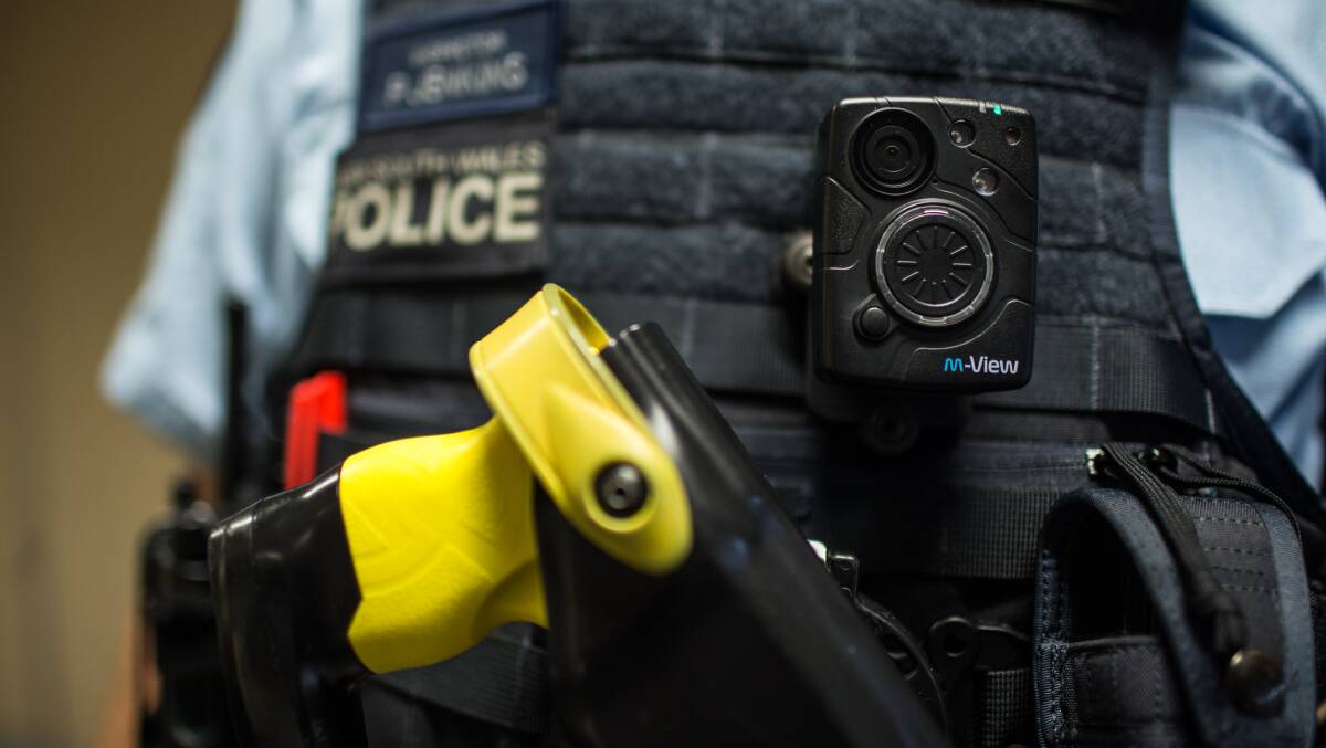 A NSW Police officer wearing a body camera. File picture by Geoff Jones