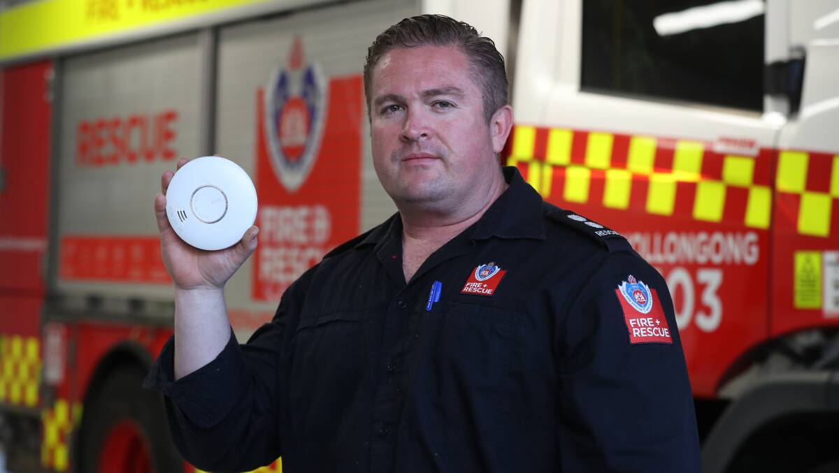 Firefighters are offering free smoke alarms and home fire safety visits, all you've got to do is book in, Fire and Rescue NSW Wollongong Station Officer Fletcher Gibson said. Picture by Robert Peet