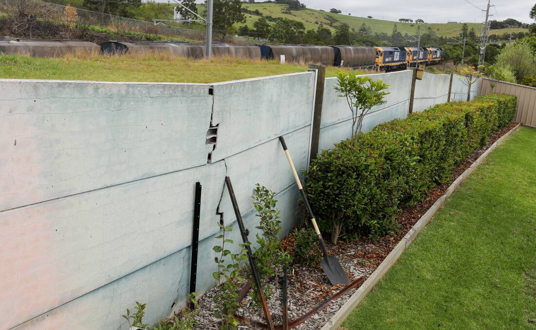 The damaged acoustic fence at the rear of Paul Wheeler's home at Flinders. Pictures by Adam McLean