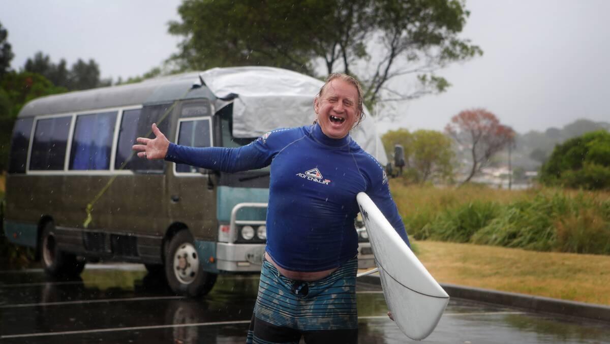 Forget the rain, Oak Flats man Jack Clarke's as happy as a duck in water in his temporary home by Lake Illawarra this week. Picture by Sylvia Liber