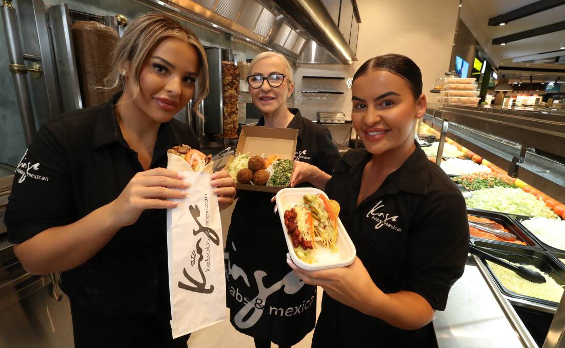 Terry Yavuz (centre) with her daughters Cemile and Ceyda at Kings Kebabs and Mexican's new store in Stockland Shellharbour. Picture by Robert Peet
