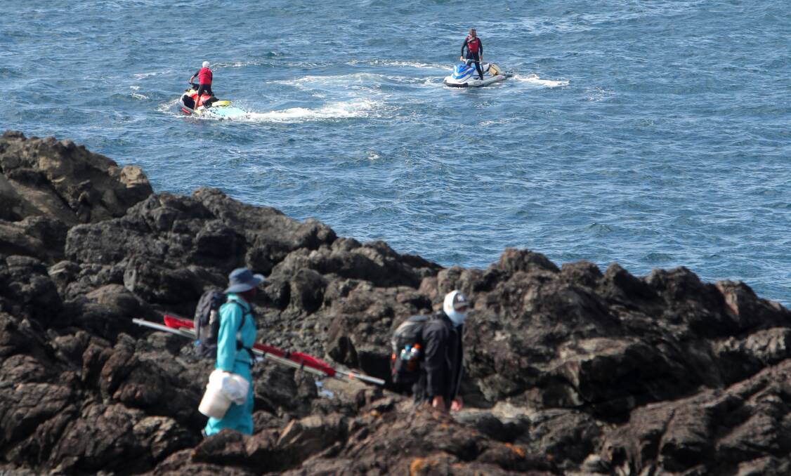 As emergency services searched for the body of missing man Michael Bui earlier this month, more rock fishers arrived at Kiama to throw their lines in. Picture by Sylvia Liber