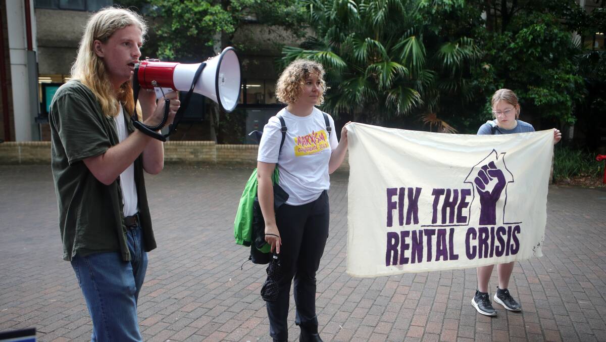A small group of protestors are calling on the University of Wollongong to address the rental crisis facing students. Pictures by Sylvia Liber