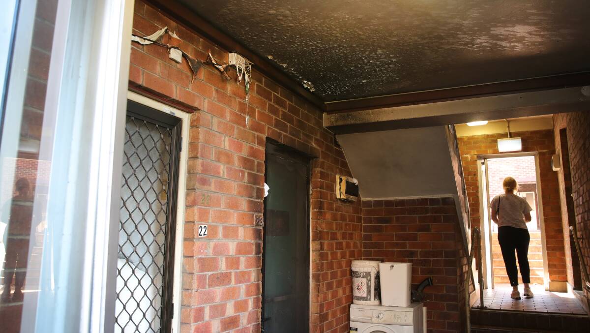 Charred markings and melted paint on the ceiling shows where a fire was lit on a mattress moved into a common area at a Cliff Road unit complex on October 12. Picture by Sylvia Liber 