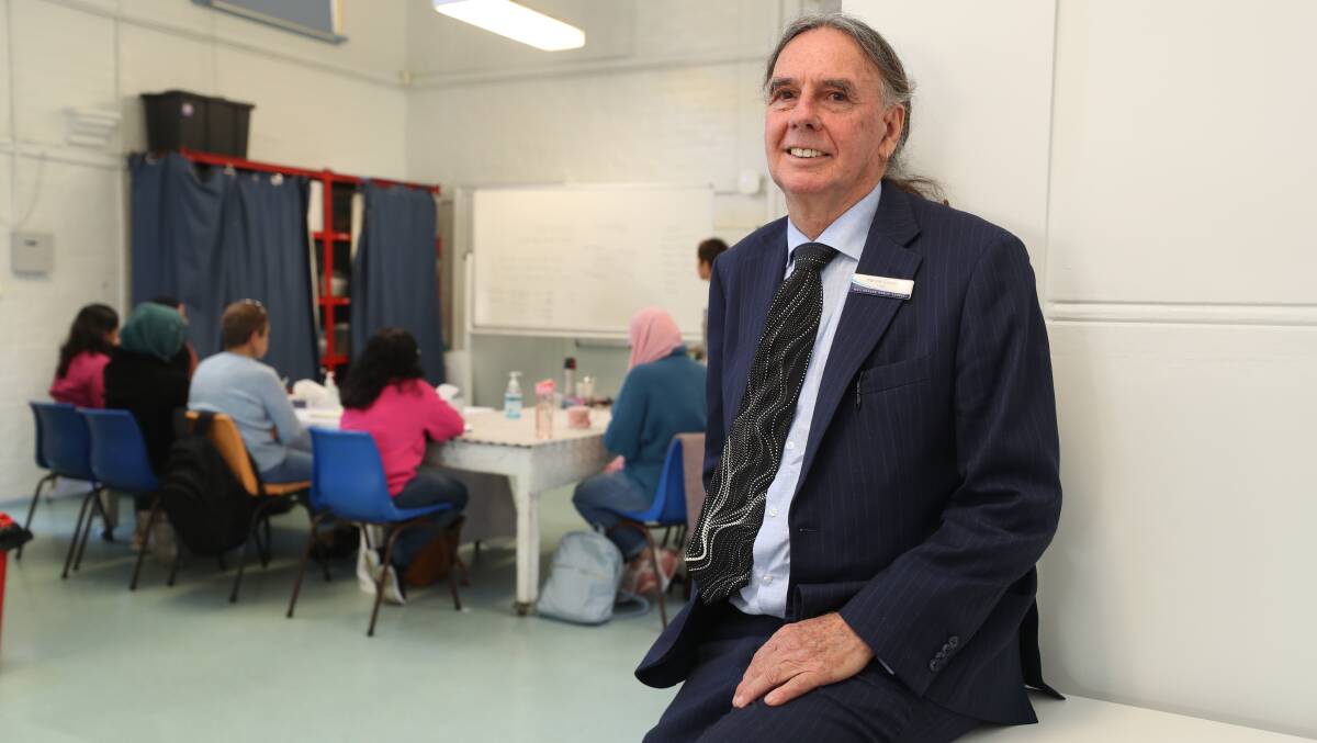 Wollongong Public School principal Harold Cosier has been a passionate teacher for decades. Picture by Robert Peet