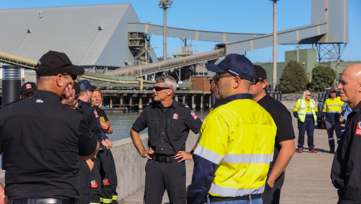Fire and Rescue NSW firefighters and Svitzer crews joined forces for firefighter training at Port Kembla in May. Picture by Adam McLean