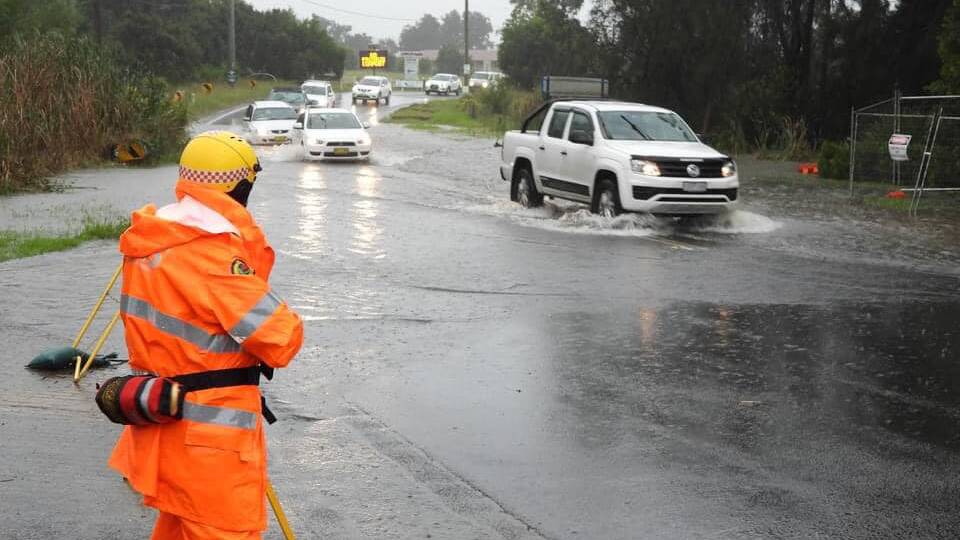 Cars driving through floodwaters during heavy rain in the Illawarra on May 4 and 5, 2024. Picture by SES Shellharbour Unit 