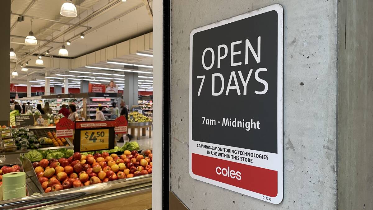 A sign warning customers that cameras and monitoring technologies are in use within the Coles store at Wollongong Central. Picture supplied