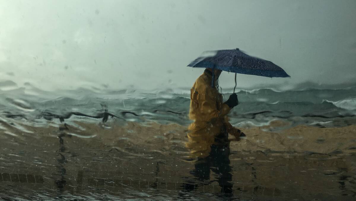 A person walking in the rain. File picture by Geoff Jones