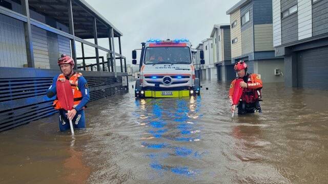 Rescues like this could have been avoided if the lake was opened, according to several Lake Conjola residents. Picture by SES Nowra