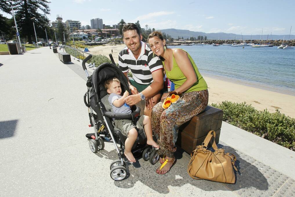 Campbelltown couple Helena and Kristof Bocian visit Wollongong once a month with their son Sebastian. Picture: DAVE TEASE