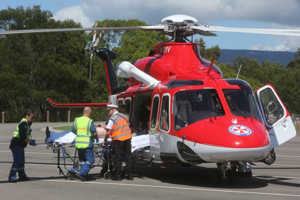 Rescue: The Illawarra Regional Airport-based medical helicopter responds to a road accident on the north Kiama bypass in October last year.