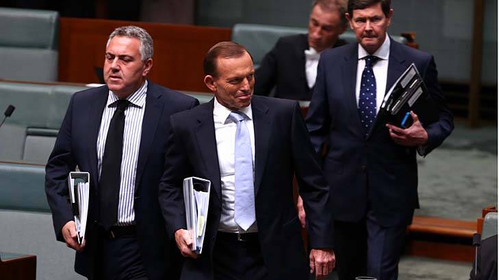 Treasurer Joe Hockey and Prime Minister Tony Abbott arrive for question time together, ahead of the cabinet meeting on Monday evening. Photo: Alex Ellinghausen
