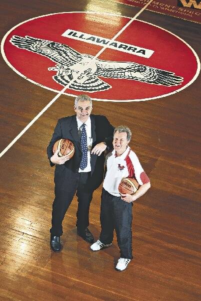 Basketball Australia chief executive Larry Sengstock and new Hawks coach Gordie McLeod in a positive mood at the Snakepit yesterday. Picture: KEN ROBERTSON