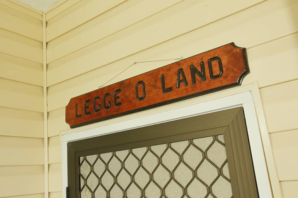 The whimsical welcoming sign at Mr Legge's home.