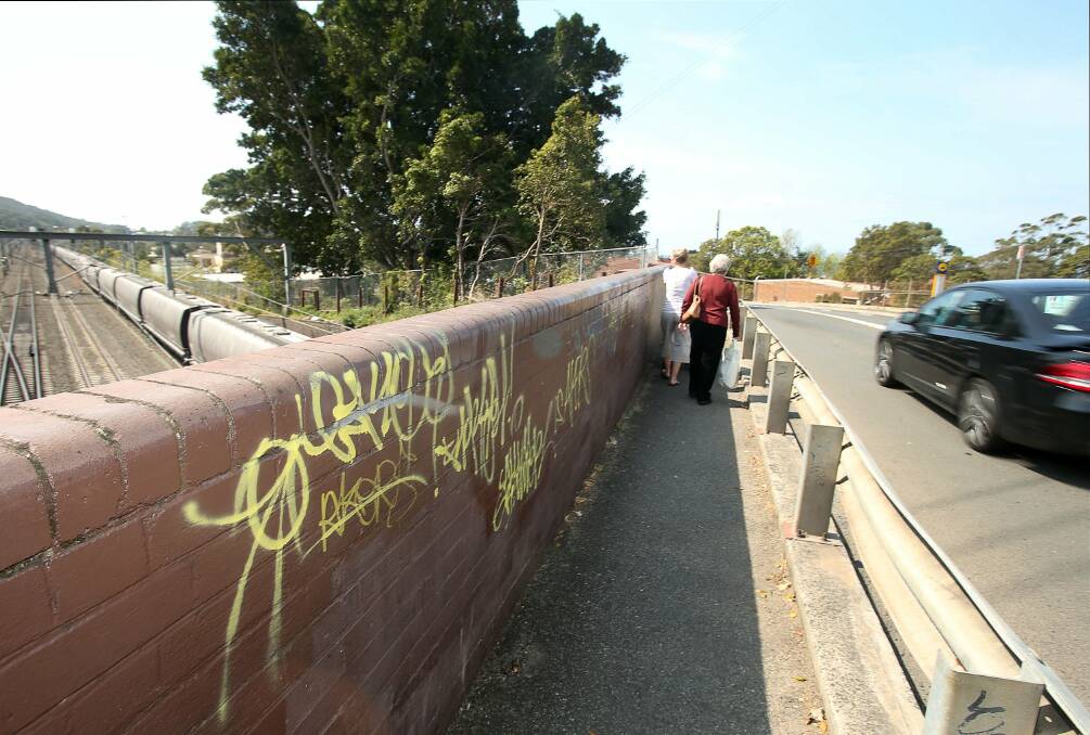 Buildings, landmarks, and even a tree, have been sprayed with unsightly graffiti in Thirroul. Pictures: KIRK GILMOUR