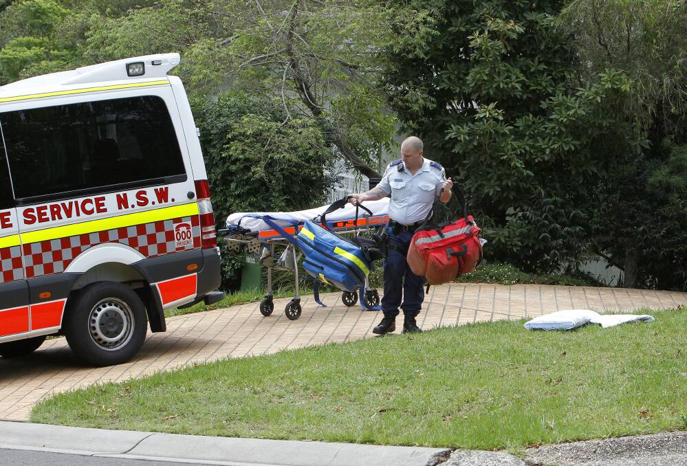 Emergency services at a Derribong Drive house in Cordeaux Heights, where a boy reportedly fell into a backyard pool. Picture: ANDY ZAKELI