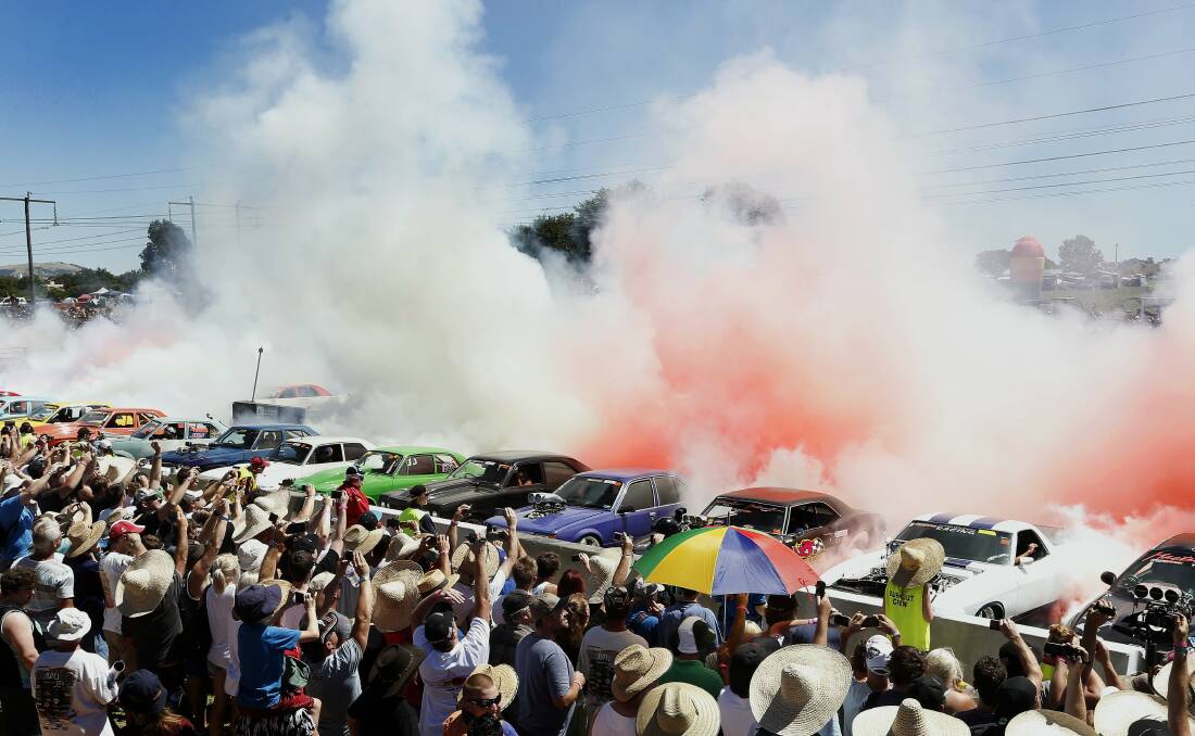 Some of the cars that broke the simultaneous burnouts world record.Picture: JEFFREY CHAN