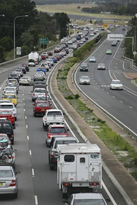Jammed: Boxing Day traffic at Haywards Bay last year. A government-commissioned planning study is looking at potential bypass options at Albion Park.