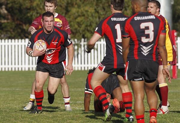 On the charge: Collies lock Phil Crosby runs the  ball  in the recent game against Shellharbour.   Picture:  ANDY ZAKELI
