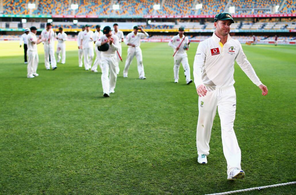 Michael Clarke leads his team from the ground at the Gabba. Picture: GETTY IMAGES