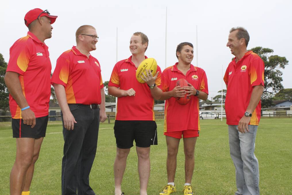 Head trainer Ray Ornelas, co-coaches Chris Nyman and Andy Wilton, player Michael Talbot, and president Marcus Hollingsworth at Shellharbour City Suns AFL club training last week. Picture: DAVID HALL