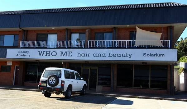 Michael Medarovski was charged over an armed robbery at Who Me Hair and Beauty Salon, pictured.