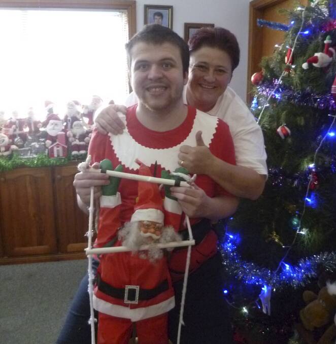 Fairy Meadow residents Stephen and Kris Rice are delighted after a Santa stolen from outside their home was returned.