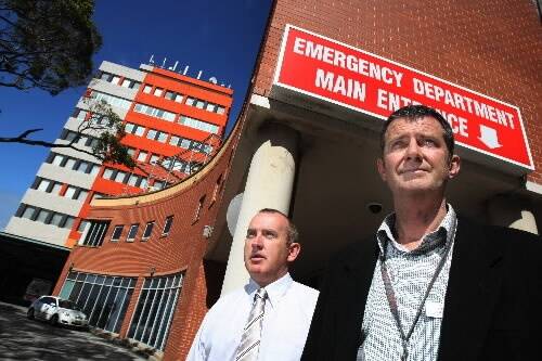 Wollongong Hospital director of emergency Dr Tom Carrigan (left) and  area health service drug and alcohol operations manager David Reid are bracing for an increase in the number of alcohol-related injuries. Picture: KEN ROBERTSON
