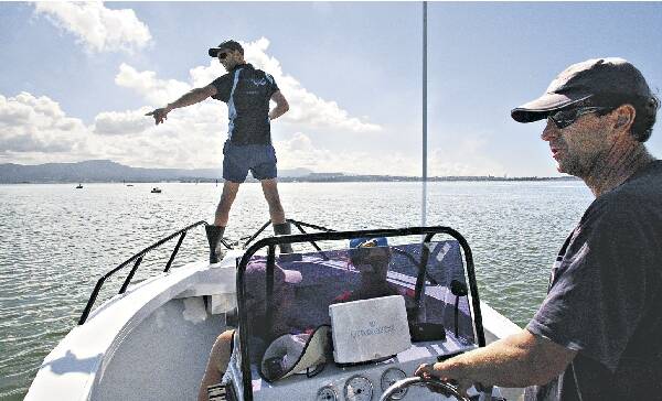 Greg Barea on Lake Illawarra during the Mercury's search for the shark. Picture: ADAM McLEAN