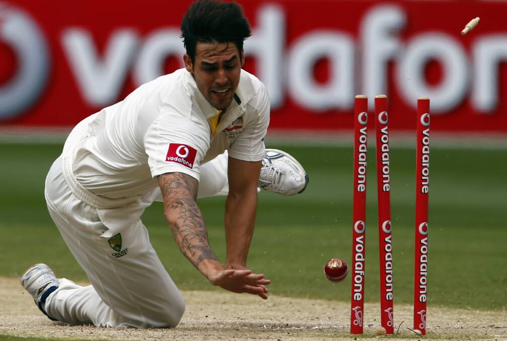 Mitchell Johnson runs out Dimuth Karunaratne for one run yesterday. Johnson bowled and batted superbly. Picture: REUTERS