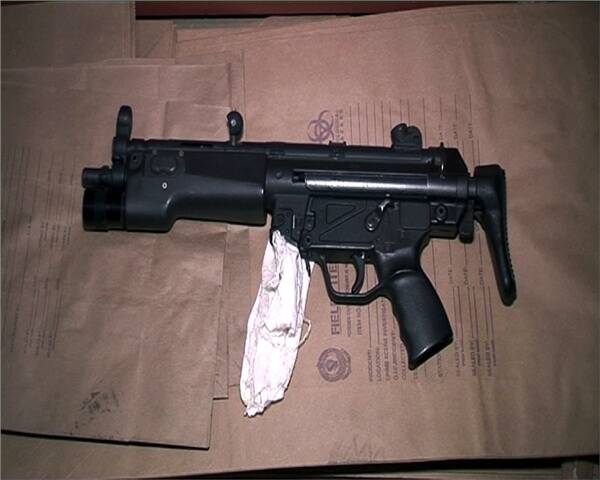 One of the sub-machine guns police allegedly seized.