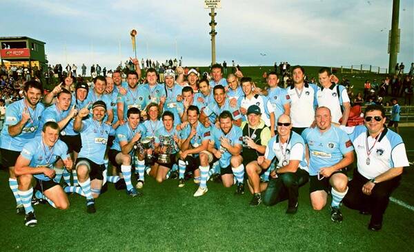 The Vikings celebrate after their 37-0 demolition job on the Shamrocks in the grand final. Picture: GREG TOTMAN