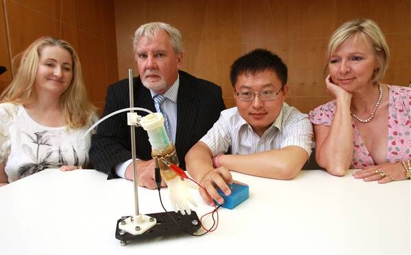 ACES associate director of strategic development Dr Bridget Munro, Wollongong Hospital director of medical oncology Professor Phil Clingan, ACES materials engineer Dr Wen Zheng and breast cancer survivor and former Playboy playmate Rosemary Paul. Picture: KIRK GILMOUR