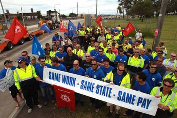Striking dock workers at Port Kembla Harbour. Picture: KIRK GILMOUR