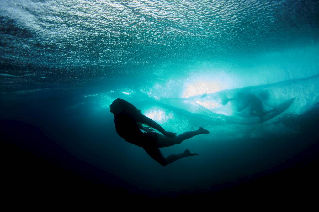 Underwater images of surfer Taylor Miller at Ningaloo Reef. Filmmaker Jon Frankcollaborated with musician Richard Tognetti to create The Reef. Picture: ED SLOANE